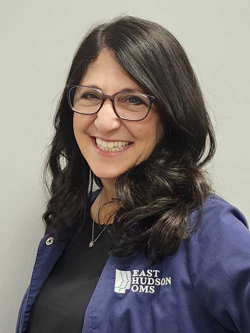 Dr. Elena Marcelle