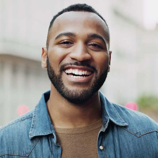 Portrait of a handsome young man in the city