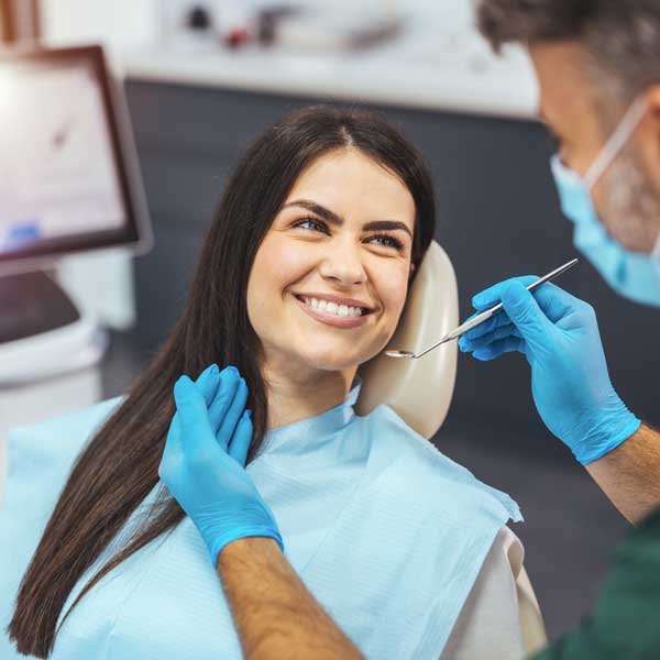 Dentist and patient in dentist office