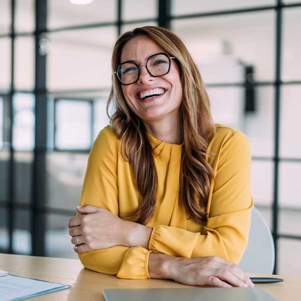 Confident businesswoman in modern office.
