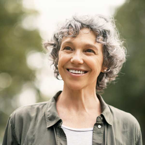 Shot of a happy senior woman spending the day in the park
